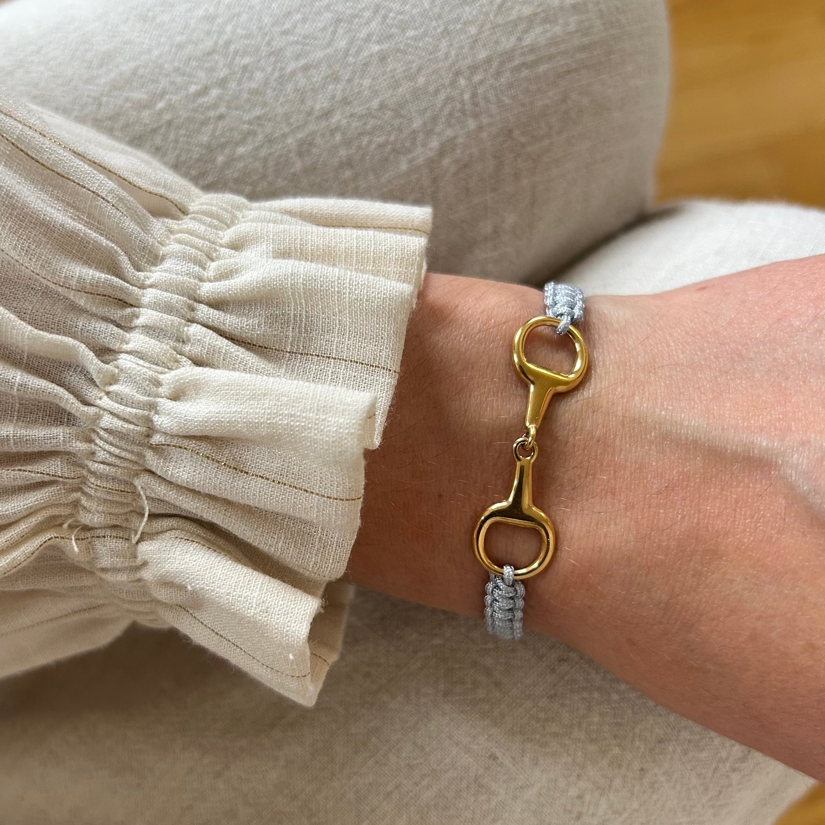 Takamaka - Bracciale in acciaio con morsetto e strass dorati