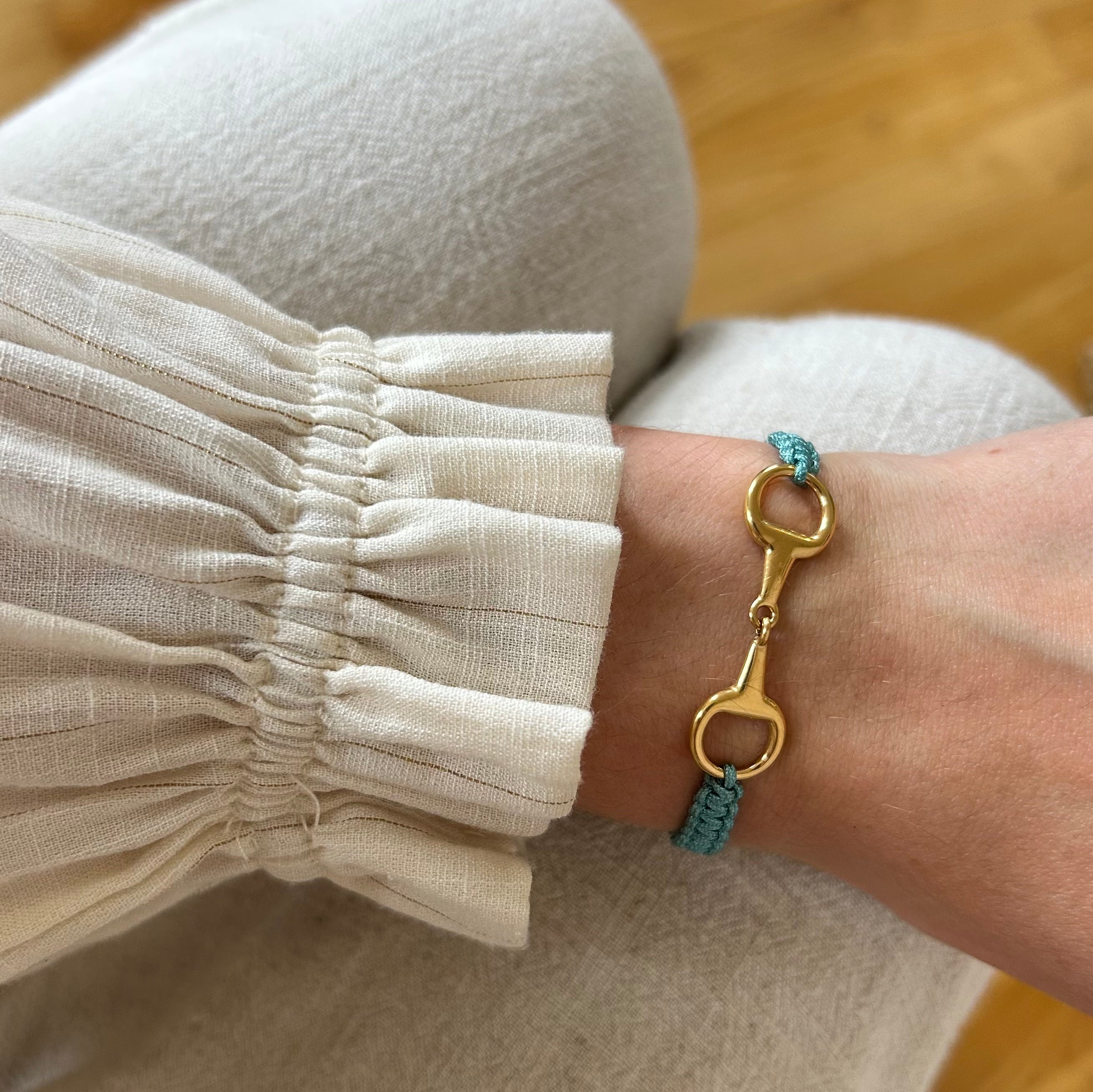 Takamaka - Bracciale in acciaio con morsetto e strass dorati